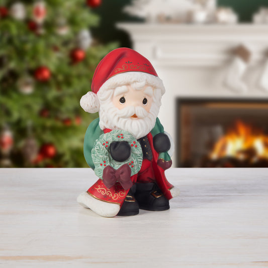 Bringing Christmas Joy To All Annual Santa Figurine